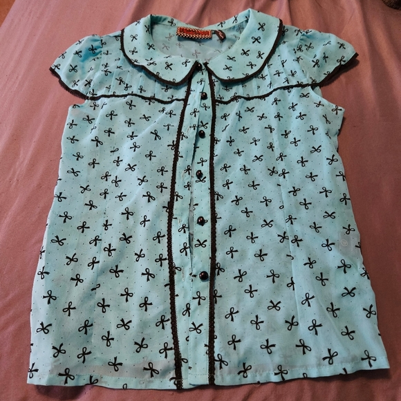 Voodoo Vixen Tops - Voodoo vixen large top teal color.